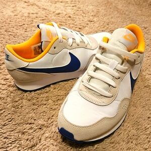 Nike Sneakers; Boys size  7y; Color: blue,white, yellow